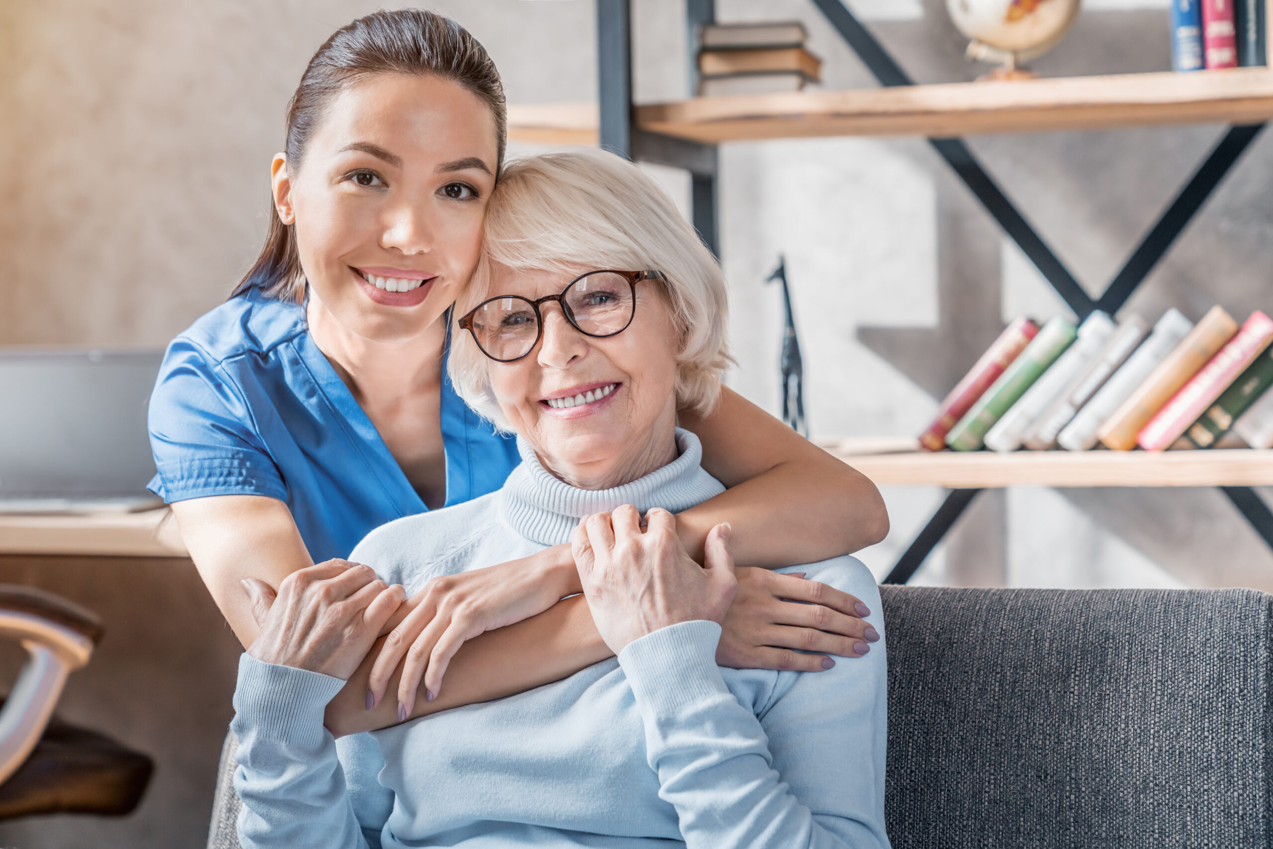 Home help service agency Kimberly caregiver assisting senior with companionship at home