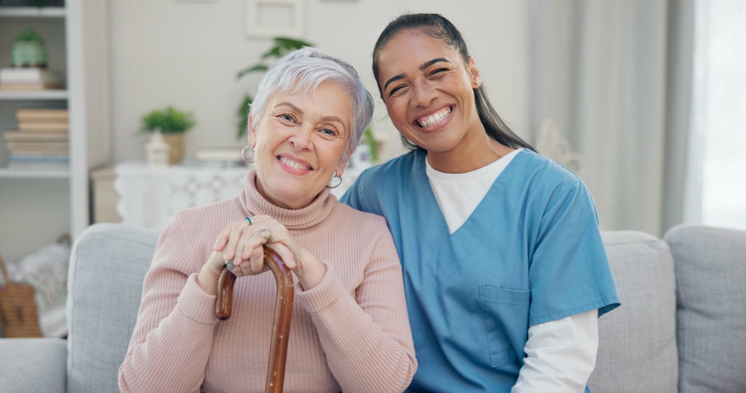 Home help care agency Boise caregiver assisting a senior with companionship and personal care during an in-home visit in Boise, Idaho.